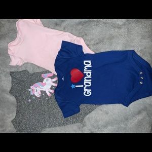 3 baby onesies